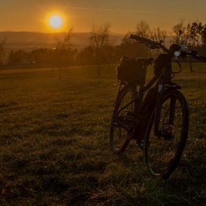 Black ebike with sunset light over Ceske Budejovice city in south Bohemia